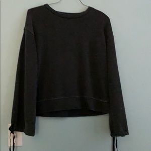 Dark grey crew neck with tie-able sleeves